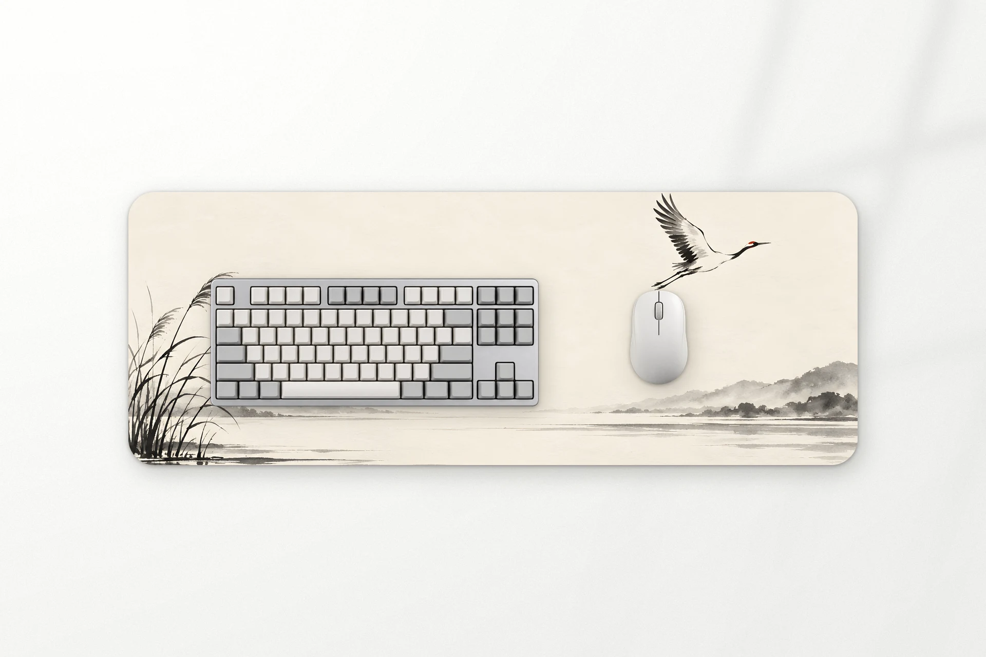 Crane desk mat, a crane in ink over a still lake, 80 x 30 cm